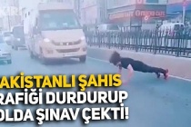 Sultangazi'de yabancı uyruklu şahıs trafiği durdurup yol ortasında şınav çekti